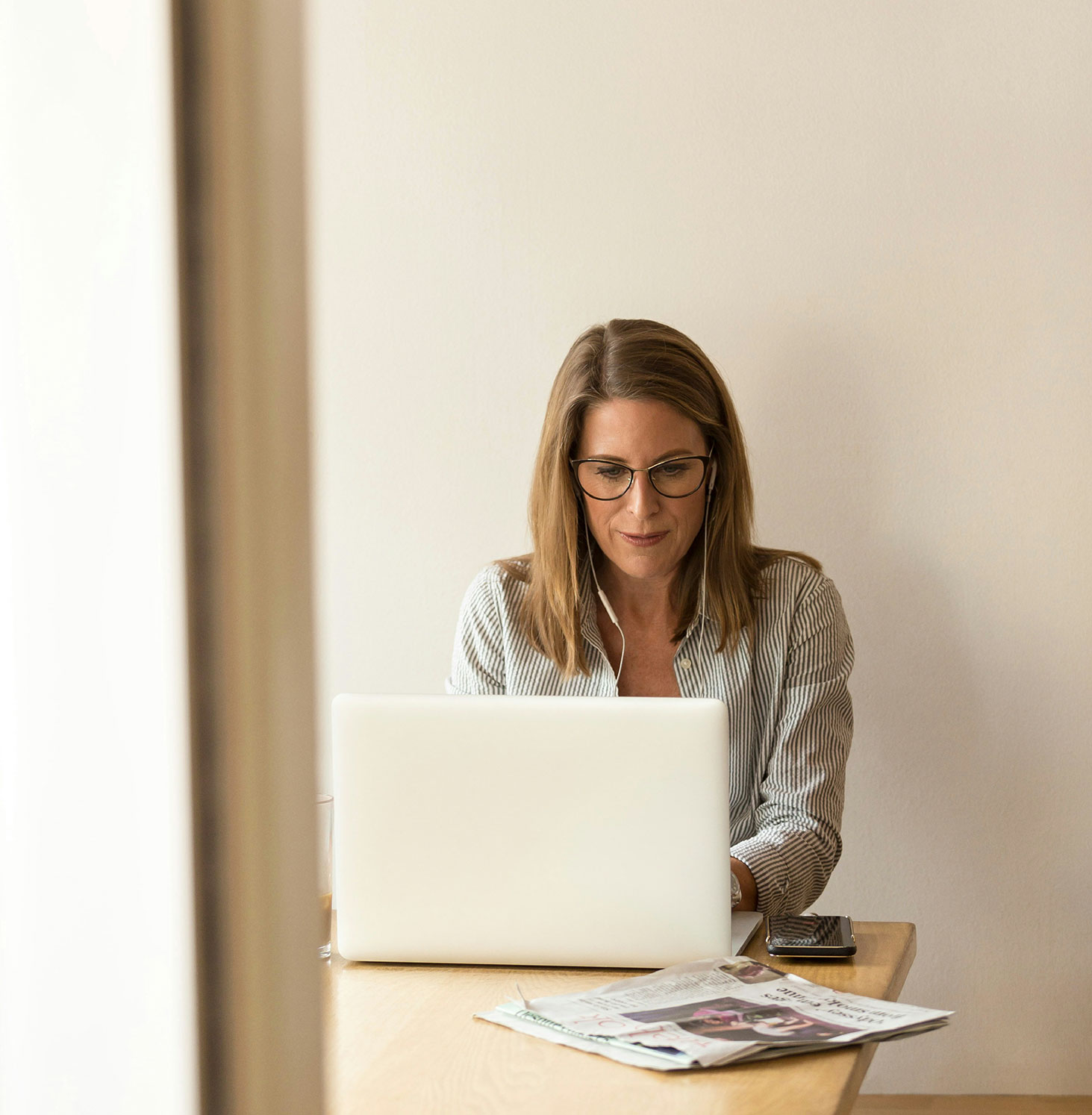 woman typing on laptop